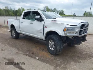 2020 Ram 2500 Laramie with VIN 3C6UR5FL4LG104147, listed as a IAAI auction lot 41924541 with 147,855 mi miles and . Bid and sale history available at DreamBid. Image 1.