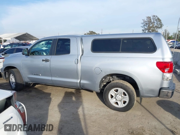 2013 Toyota Tundra z VIN 5TFRM5F17DX063683, wystawiony jako IAAI lot #41603196 z przebiegiem Nie podano mil oraz . Historia ofert i sprzedaży dostępna na DreamBid. Obrazek 14.