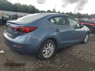 2016 Mazda 3 i Touring with VIN JM1BM1W71G1285237, listed as a Copart auction lot 71208844 with 94,534 mi miles and Salvage Title. Bid and sale history available at DreamBid. Image 3.