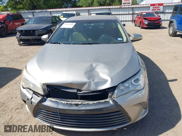 2016 Toyota Camry XLE with VIN 4T4BF1FKXGR519647, listed as a IAAI auction lot 42010266 with 123,595 mi miles and . Bid and sale history available at DreamBid. Image 12.
