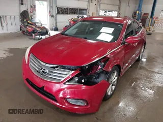 2012 Hyundai Azera z VIN KMHFG4JG7CA183643, wystawiony jako IAAI lot #42503232 z przebiegiem 180 485 mil mil oraz . Historia ofert i sprzedaży dostępna na DreamBid. Obrazek 6.