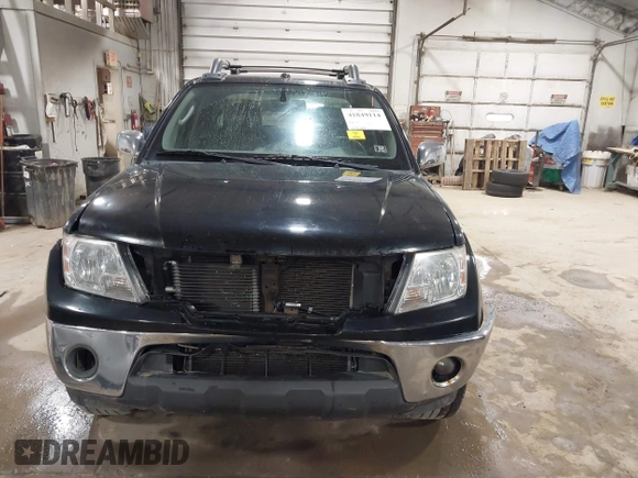 2010 Nissan Frontier Pro-4X z VIN 1N6AD0EV6AC443991, wystawiony jako IAAI lot #41849114 z przebiegiem 235 361 mil mil oraz . Historia ofert i sprzedaży dostępna na DreamBid. Obrazek 13.