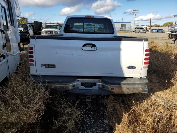 2001 Ford F-350 XL with VIN 1FTWW32F31ED39867, listed as a Copart auction lot 80069644 with 241,113 mi miles and Salvage title. Bid and sale history available at DreamBid. Image 6.