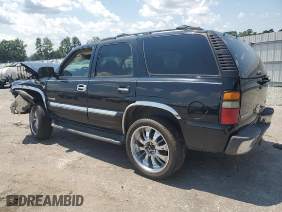 2005 GMC Yukon SLE with VIN 1GKEC13T35R233595, listed as a Copart auction lot 64571554 with 0 mi miles and Salvage Title. Bid and sale history available at carsss.com. Image 2.