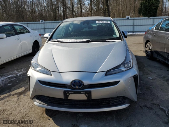 2021 Toyota Prius L Eco with VIN JTDKAMFU3M3147845, listed as a Copart auction lot 88705855 with 59,418 mi miles and Salvage Title. Bid and sale history available at carsss.com. Image 5.