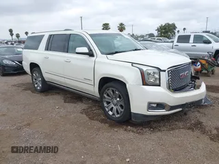 2015 GMC Yukon XL Denali with VIN 1GKS2JKJ7FR641430, listed as a IAAI auction lot 42163969 with 129,085 mi miles. Bid and sale history available at carsss.com. Image 1.