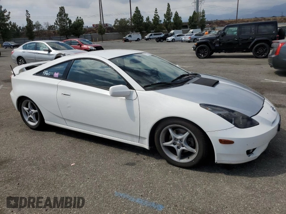 2004 Toyota Celica GT with VIN JTDDR32TX40174017, listed as a Copart auction lot 73748694 with 138,701 mi miles and Salvage Title. Bid and sale history available at DreamBid. Image 4.