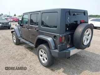 2014 Jeep Wrangler Unlimited Sahara with VIN 1C4BJWEG8EL285843, listed as a IAAI auction lot 42399090 with Not provided miles and . Bid and sale history available at DreamBid. Image 3.