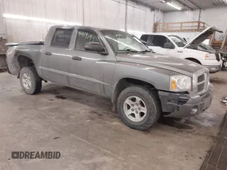2007 Dodge Dakota SLT z VIN 1D7HW48J17S138642, wystawiony jako IAAI lot #41419794 z przebiegiem 79 350 mil mil oraz . Historia ofert i sprzedaży dostępna na DreamBid. Obrazek 1.