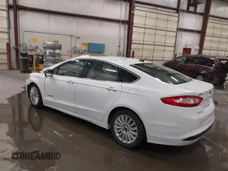2015 Ford Fusion SE Hybrid with VIN 3FA6P0LU1FR225241, listed as a IAAI auction lot 42349797 with 85,725 mi miles and . Bid and sale history available at DreamBid. Image 3.