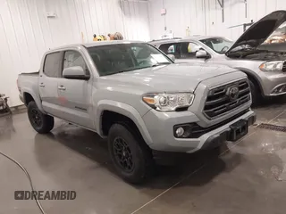 2019 Toyota Tacoma SR z VIN 3TMCZ5AN2KM223540, wystawiony jako IAAI lot #42009421 z przebiegiem 39 693 mil mil oraz . Historia ofert i sprzedaży dostępna na DreamBid. Obrazek 1.