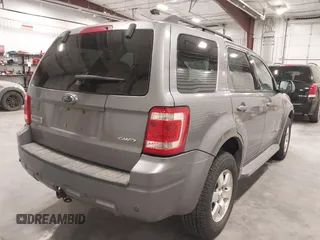 2008 Ford Escape Limited with VIN 1FMCU94178KC99233, listed as a IAAI auction lot 41820482 with 212,498 mi miles. Bid and sale history available at carsss.com. Image 4.