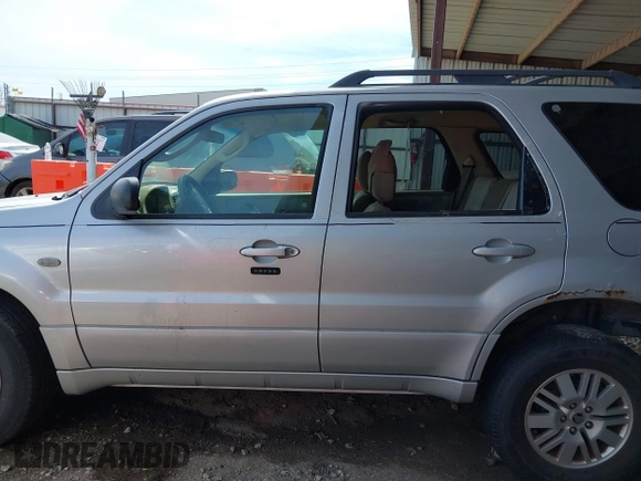 2006 Mercury Mariner Convenience with VIN 4M2YU56Z86KJ12563, listed as a IAAI auction lot 41817401 with 152,156 mi miles and . Bid and sale history available at DreamBid. Image 14.