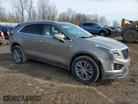 2022 Cadillac XT5 AWD Premium Luxury with VIN 1GYKNDRSXNZ121976, listed as a Copart auction lot 47200175 with 21,627 mi miles and Clean title. Bid and sale history available at DreamBid. Image 4.
