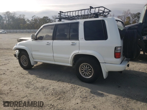 2000 Isuzu Trooper S with VIN JACDJ58X6Y7J06807, listed as a Copart auction lot 79179454 with 157,308 mi miles and Salvage title. Bid and sale history available at DreamBid. Image 2.