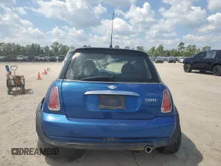 2006 MINI Hardtop with VIN WMWRC33566TK15023, listed as a Copart auction lot 76392014 with Not provided miles and Salvage title. Bid and sale history available at DreamBid. Image 6.