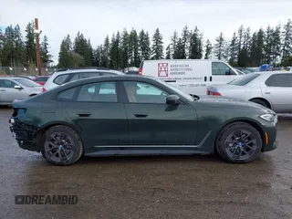 2023 BMW i4 eDrive35 z VIN WBY43AW04PFR19351, wystawiony jako IAAI lot #41841961 z przebiegiem 28 175 mil mil oraz . Historia ofert i sprzedaży dostępna na DreamBid. Obrazek 14.