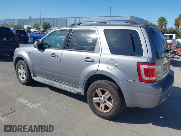 2008 Ford Escape Hybrid with VIN 1FMCU49H78KE79028, listed as a IAAI auction lot 42283170 with 131,642 mi miles and . Bid and sale history available at DreamBid. Image 3.