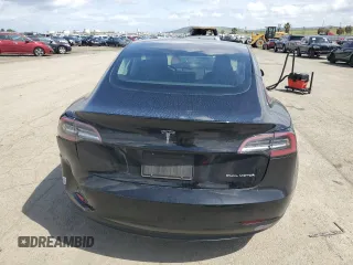 2018 Tesla Model 3 Long Range Battery with VIN 5YJ3E1EB1JF186827, listed as a Copart auction lot 51179535 with 53,649 mi miles and Salvage Title. Bid and sale history available at DreamBid. Image 6.