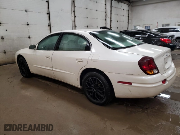 2003 Oldsmobile Aurora z VIN 1G3GS64C534171677, wystawiony jako Copart lot #74768254 z przebiegiem 113 932 mil mil oraz Tytuł czysty. Historia ofert i sprzedaży dostępna na DreamBid. Obrazek 2.