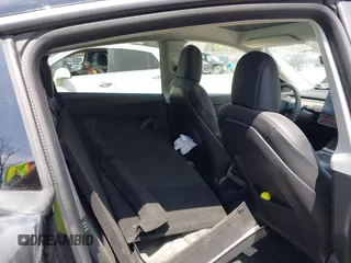 2022 Tesla Model Y Performance with VIN 7SAYGDEF7NF310113, listed as a IAAI auction lot 42038407 with 46,052 mi miles and . Bid and sale history available at DreamBid. Image 8.