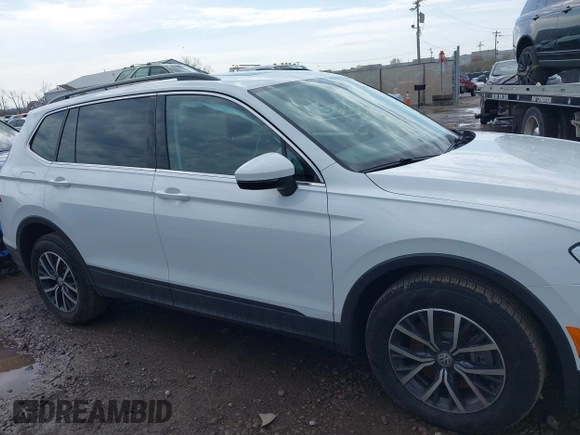 2019 Volkswagen Tiguan SE with VIN 3VV2B7AX7KM125053, listed as a IAAI auction lot 41892539 with 78,865 mi miles and . Bid and sale history available at DreamBid. Image 13.