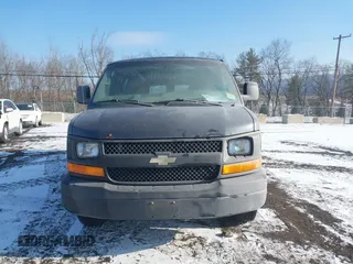 2014 Chevrolet Express Cargo Van with VIN 1GCWGGBA5E1205786, listed as a IAAI auction lot 41339085 with 201,460 mi miles. Bid and sale history available at carsss.com. Image 12.