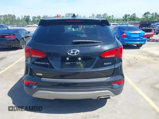 2017 Hyundai Santa Fe 2.4L z VIN 5NMZU3LB4HH024307, wystawiony jako IAAI lot #42147423 z przebiegiem 72 504 mil mil oraz . Historia ofert i sprzedaży dostępna na DreamBid. Obrazek 16.