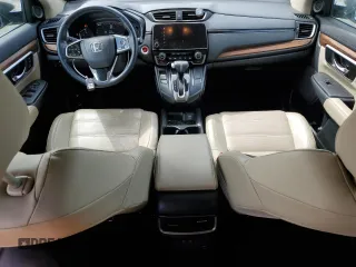 2018 Honda CR-V Touring with VIN 5J6RW2H98JL002657, listed as a Copart auction lot 55075965 with 61,327 mi miles and Salvage Title. Bid and sale history available at DreamBid. Image 8.