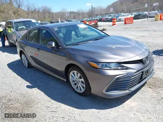 2022 Toyota Camry LE with VIN 4T1C11AK2NU054251, listed as a IAAI auction lot 41880293 with 48,559 mi miles. Bid and sale history available at carsss.com. Image 1.