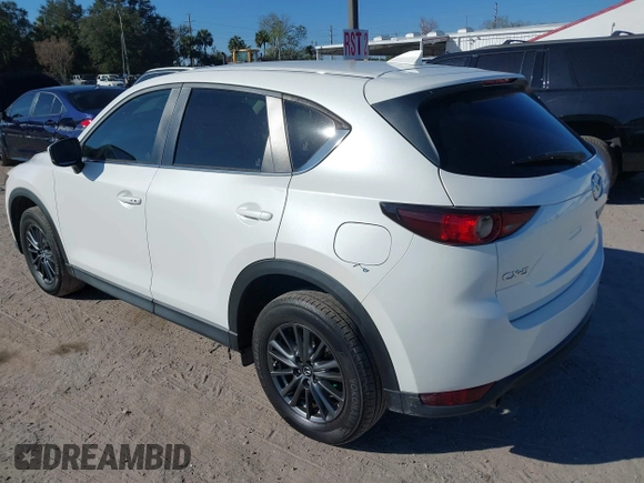 2020 Mazda CX-5 Touring with VIN JM3KFACM6L0737727, listed as a IAAI auction lot 41283200 with 85,949 mi miles and . Bid and sale history available at carsss.com. Image 3.