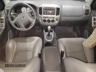 2005 Ford Escape XLT z VIN 1FMYU93145KA20050, wystawiony jako Copart lot #76794024 z przebiegiem 98 559 mil mil oraz Szkoda całkowita • Salvage title. Historia ofert i sprzedaży dostępna na DreamBid. Obrazek 8.