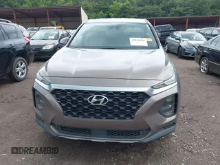 2020 Hyundai Santa Fe SE with VIN 5NMS23AD4LH142202, listed as a IAAI auction lot 42526020 with 59,964 mi miles and . Bid and sale history available at DreamBid. Image 12.