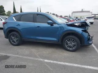 2017 Mazda CX-5 Sport with VIN JM3KFABL9H0142189, listed as a IAAI auction lot 41722354 with 109,865 mi miles. Bid and sale history available at carsss.com. Image 12.