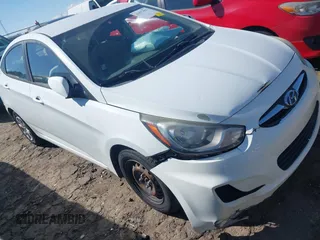 2014 Hyundai Accent GLS with VIN KMHCT4AE4EU590415, listed as a IAAI auction lot 41877817 with 169,285 mi miles. Bid and sale history available at carsss.com. Image 1.