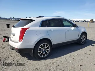 2012 Cadillac SRX Premium Collection with VIN 3GYFNFE39CS515037, listed as a Copart auction lot 55797235 with 146,778 mi miles and Salvage title. Bid and sale history available at DreamBid. Image 3.