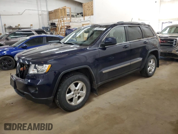 2012 Jeep Grand Cherokee Laredo with VIN 1C4RJFAG9CC221229, listed as a Copart auction lot 52035545 with 70,332 mi miles and Salvage Title. Bid and sale history available at carsss.com. Image 1.