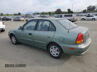 2004 Hyundai Accent GL with VIN KMHCG45C14U540938, listed as a Copart auction lot 46701935 with 71,891 mi miles and Salvage Title. Bid and sale history available at carsss.com. Image 2.