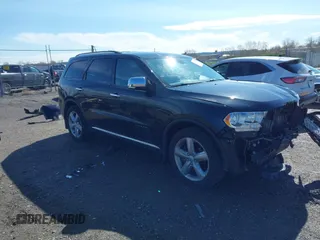 2013 Dodge Durango Citadel z VIN 1C4RDJEG9DC540135, wystawiony jako IAAI lot #42077404 z przebiegiem 161 261 mil mil oraz . Historia ofert i sprzedaży dostępna na DreamBid. Obrazek 1.