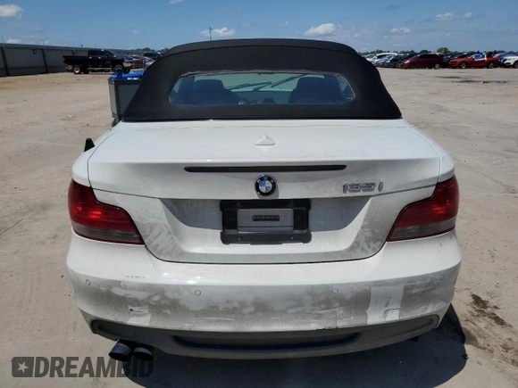 2009 BMW 1 Series 135i with VIN WBAUN93599VK40210, listed as a Copart auction lot 54166905 with 148,899 mi miles and Salvage title. Bid and sale history available at DreamBid. Image 6.
