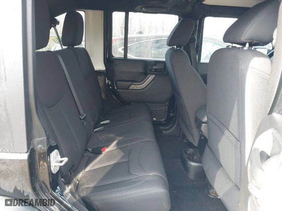 2013 Jeep Wrangler Unlimited Freedom Edition with VIN 1C4BJWDG8DL648870, listed as a IAAI auction lot 41909372 with 184,203 mi miles. Bid and sale history available at carsss.com. Image 8.