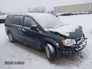 2013 Dodge Grand Caravan SE with VIN 2C4RDGBGXDR746630, listed as a IAAI auction lot 41239381 with 213,421 mi miles and . Bid and sale history available at DreamBid. Image 1.