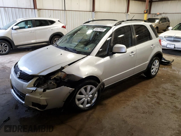 2010 Suzuki SX4 z VIN JS2YB5A31A6302436, wystawiony jako Copart lot #88473455 z przebiegiem 78 839 mil mil oraz Szkody całkowita. Historia ofert i sprzedaży dostępna na DreamBid. Obrazek 1.