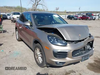 2016 Porsche Cayenne z VIN WP1AA2A2XGKA15096, wystawiony jako IAAI lot #41868566 z przebiegiem 93 640 mil mil oraz . Historia ofert i sprzedaży dostępna na DreamBid. Obrazek 1.