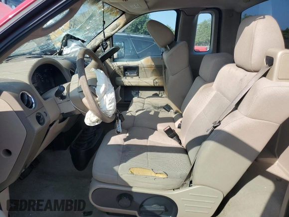 2005 Ford F-150 STX with VIN 1FTRF04W05KC08119, listed as a Copart auction lot 69045024 with 103,924 mi miles and Salvage title. Bid and sale history available at DreamBid. Image 7.