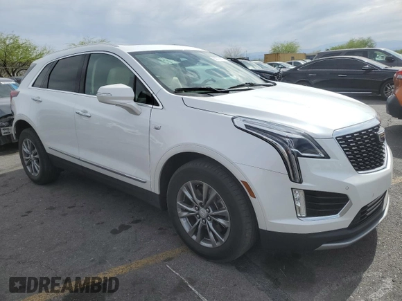 2021 Cadillac XT5 FWD Premium Luxury with VIN 1GYKNCRS0MZ110560, listed as a Copart auction lot 52779575 with 44,559 mi miles and Salvage title. Bid and sale history available at DreamBid. Image 4.