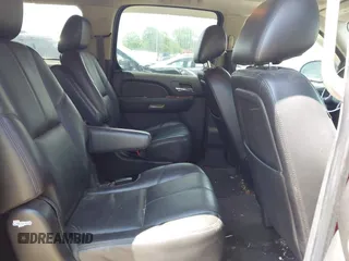 2012 Chevrolet Suburban LT with VIN 1GNSKJE7XCR239853, listed as a IAAI auction lot 42365421 with 283,450 mi miles and . Bid and sale history available at DreamBid. Image 8.
