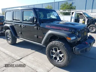 2021 Jeep Wrangler Unlimited Rubicon z VIN 1C4JJXFM5MW722572, wystawiony jako IAAI lot #41667167 z przebiegiem Nie podano mil oraz . Historia ofert i sprzedaży dostępna na DreamBid. Obrazek 1.