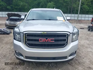 2019 GMC Yukon XL SLT z VIN 1GKS1GKC0KR242408, wystawiony jako IAAI lot #42144783 z przebiegiem Nie podano mil oraz . Historia ofert i sprzedaży dostępna na DreamBid. Obrazek 11.