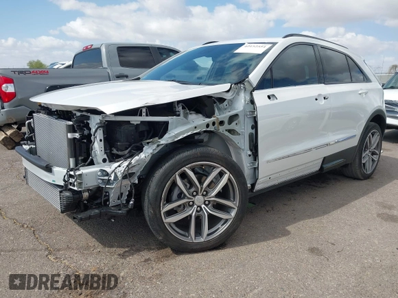 2022 Cadillac XT4 FWD Sport with VIN 1GYFZER44NF164899, listed as a IAAI auction lot 42152554 with 8,058 mi miles and . Bid and sale history available at DreamBid. Image 18.